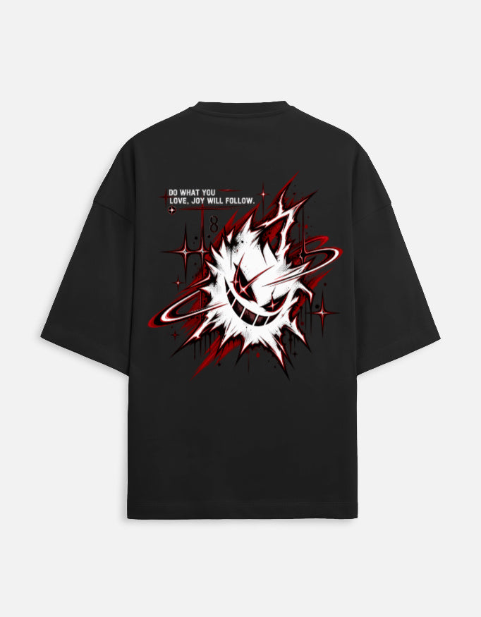 A black short-sleeve graphic T-shirt shown flat against a light gray background. The back of the shirt features a large anime-style character print in white and gray with red text and red splatter details.