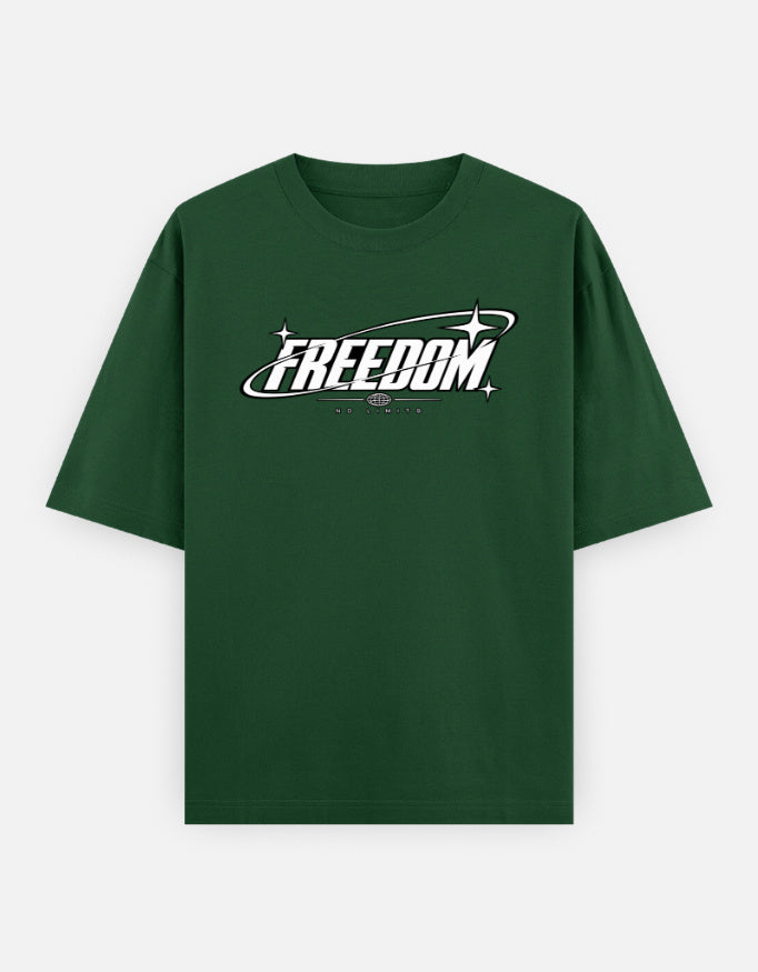 A dark green blue short-sleeve t-shirt with a white graphic on the chest reading 'FREEDOM' inside a stylized space-like oval with stars.