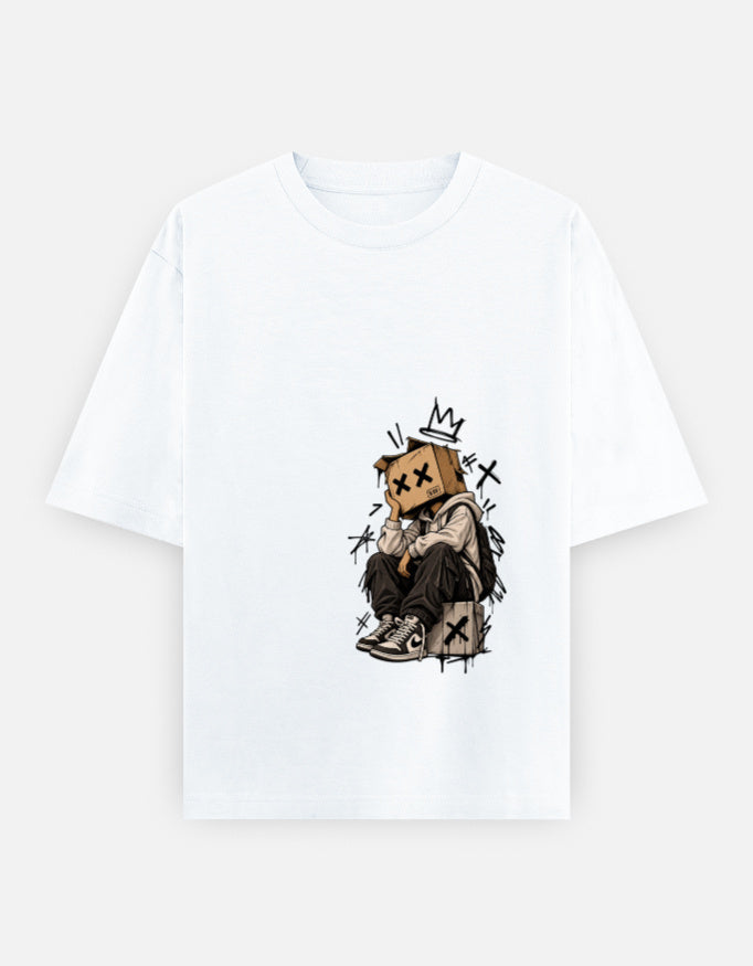 A white short-sleeve crewneck t-shirt featuring a central graphic of a cardboard box character wearing a small crown, sitting in a distressed, sketch-like style.