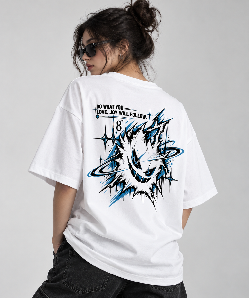 A woman wearing an oversized white graphic T-shirt, shown from the back. The shirt features a large black and blue comic-style explosion graphic with the text 'DO WHAT YOU LOVE, JAY WILL FOLLOW' and the number 8.