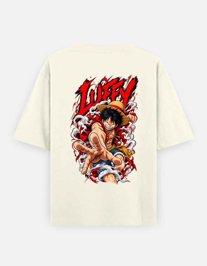 An off-white short-sleeve t-shirt featuring a large graphic print of the character Luffy from One Piece on the back, with the word 'LUFFY' in bold red letters above him.