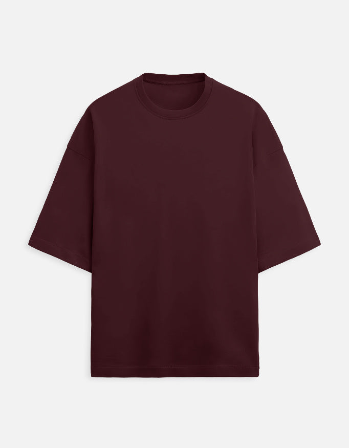 Maroon t-shirt with a small red flower design on a white background