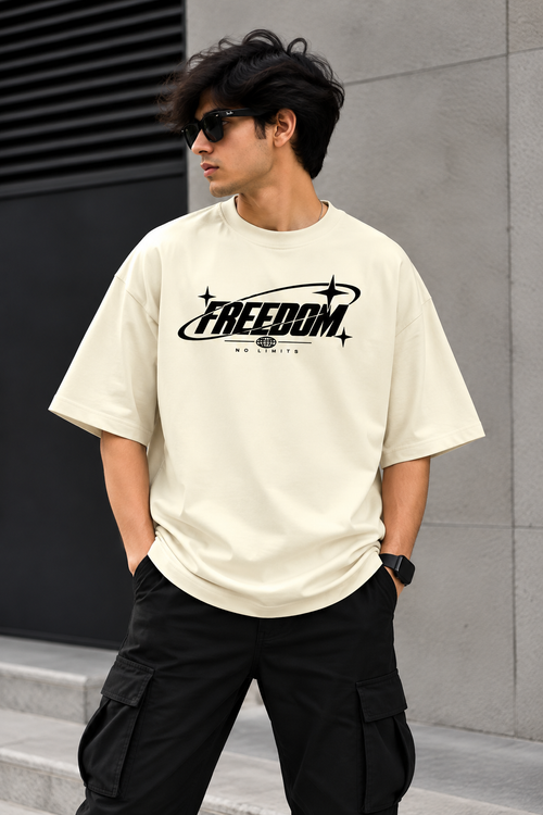 Model wearing off white oversized Freedom graphic streetwear t-shirt back