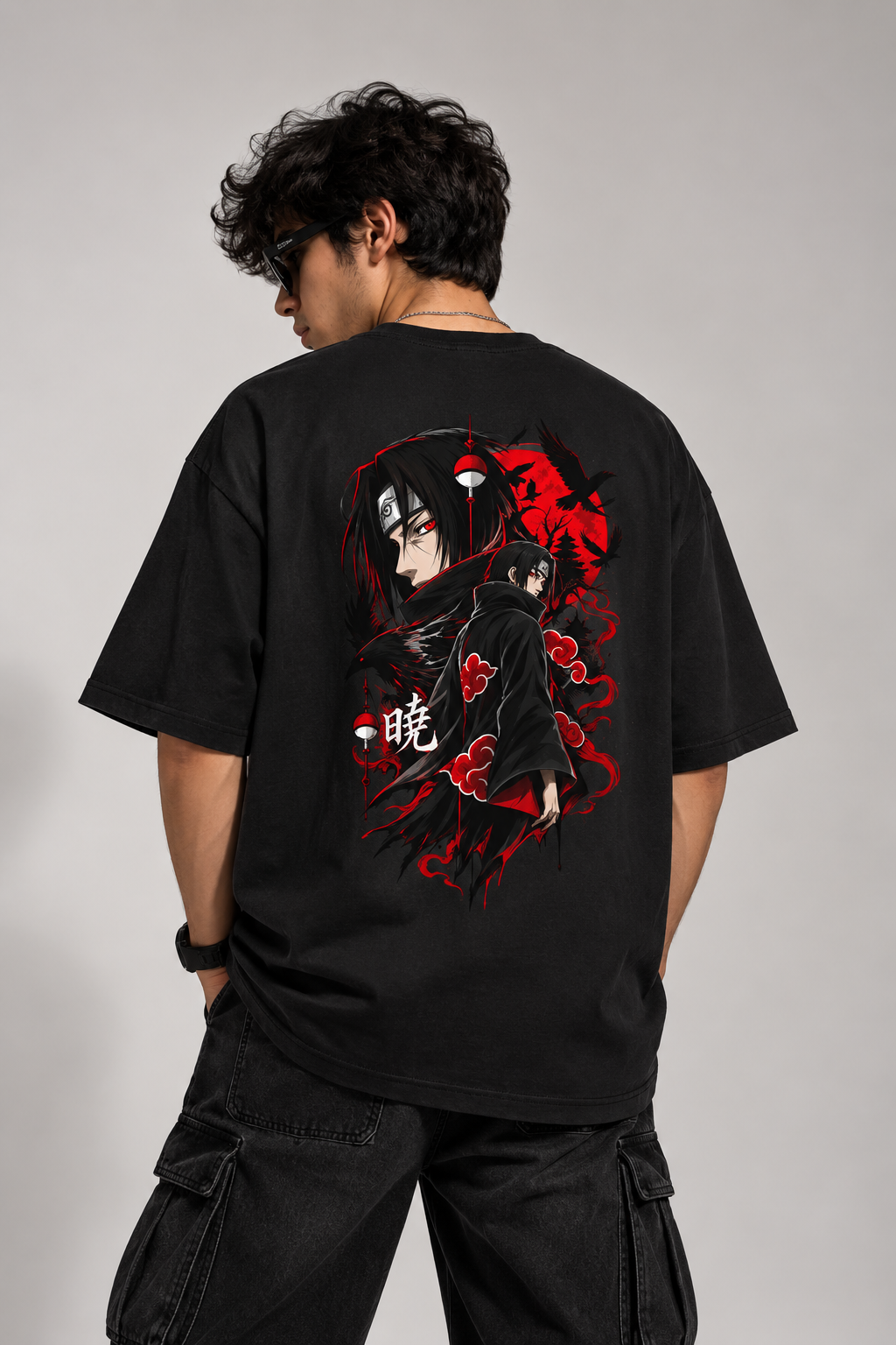 model wearing itachi anime tshirt oversized black