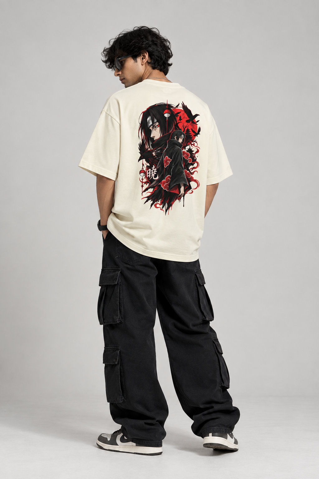 model wearing itachi anime tshirt oversized offwhite