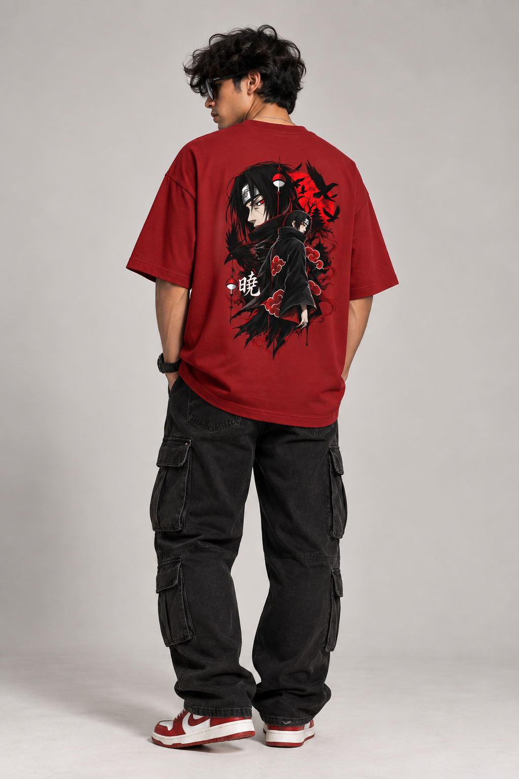 model wearing itachi anime tshirt oversized red